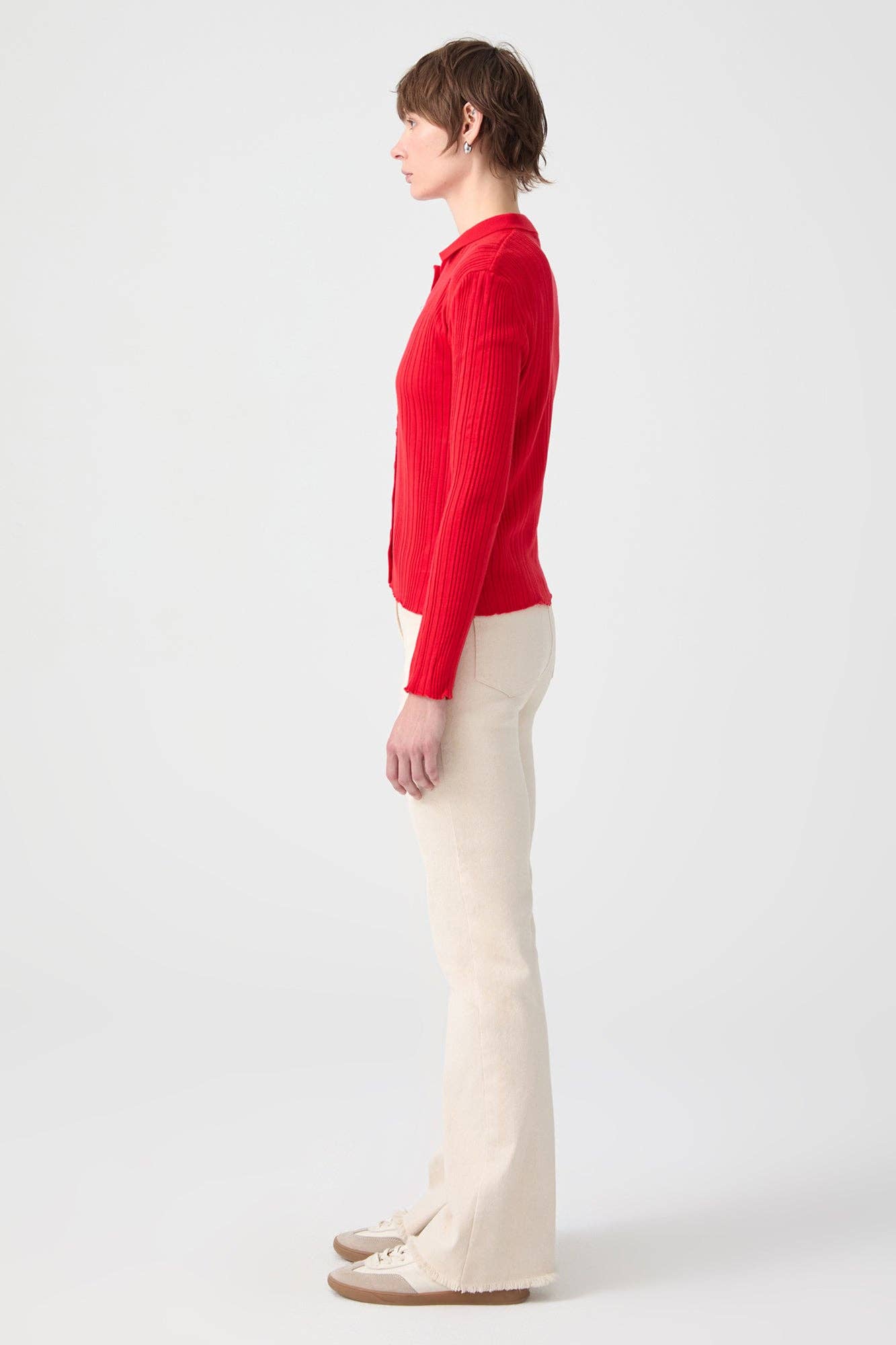 Top in maglia a coste con colletto polo e bottoni