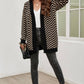 Cardigan smanicato in maglia color vino