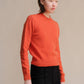 Maglione girocollo in tweed cropped in lana riciclata