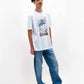 T-shirt unisex in cotone biologico con stampa castello tra le nuvole