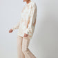 Maglione oversize beige con maxi fantasia floreale