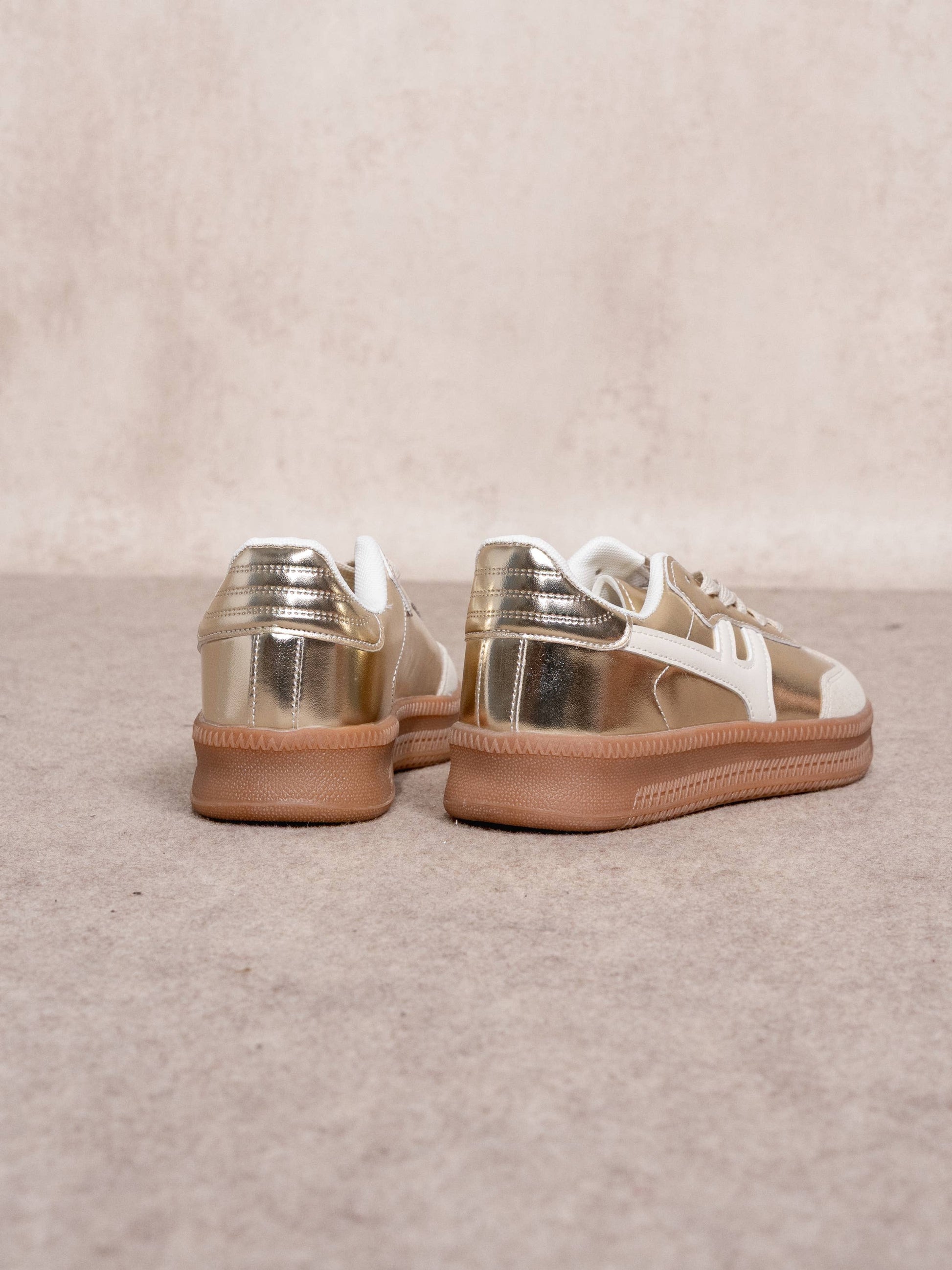 Sneakers donna metallizzate oro con suola in gomma