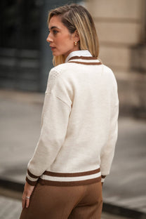 Maglione in maglia con scollo a V a righe