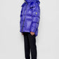 Piumino oversize viola con cappuccio removibile