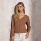 Cardigan in maglia con bottoni dorati
