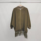 Poncho in maglia con frange e zip, maniche a pipistrello