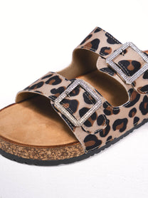 Sandali bassi animalier con fibbie gioiello