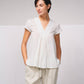 Blusa in cotone con scollo a V e volant
