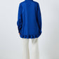 Camicia lunga indaco con orlo a balze