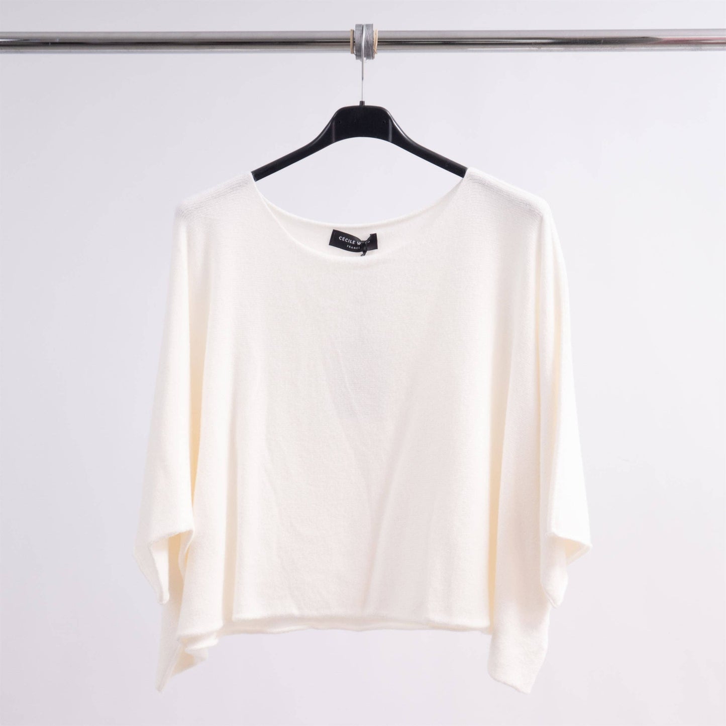 Maglia ampia con scollo a barca e maniche pipistrello