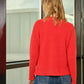 Top in maglia a costine con scollo polo