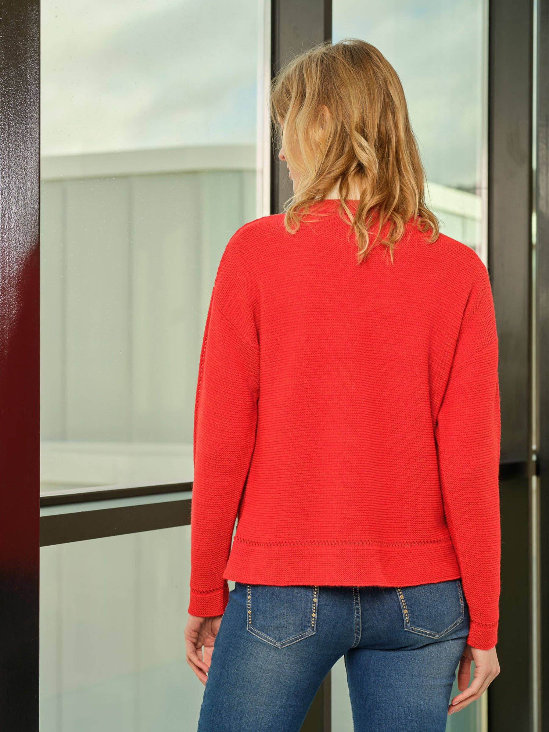 Top in maglia a costine con scollo polo