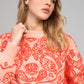 Maglione oversize jacquard bandana color pesca