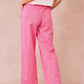 Pantaloni a righe rosa e bianche in cotone a gamba larga