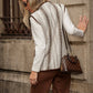 Gilet in lana jacquard con motivo geometrico