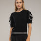 Maglia in cotone con maniche a rosetta