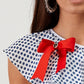 Body in maglia monospalla con volant a pois