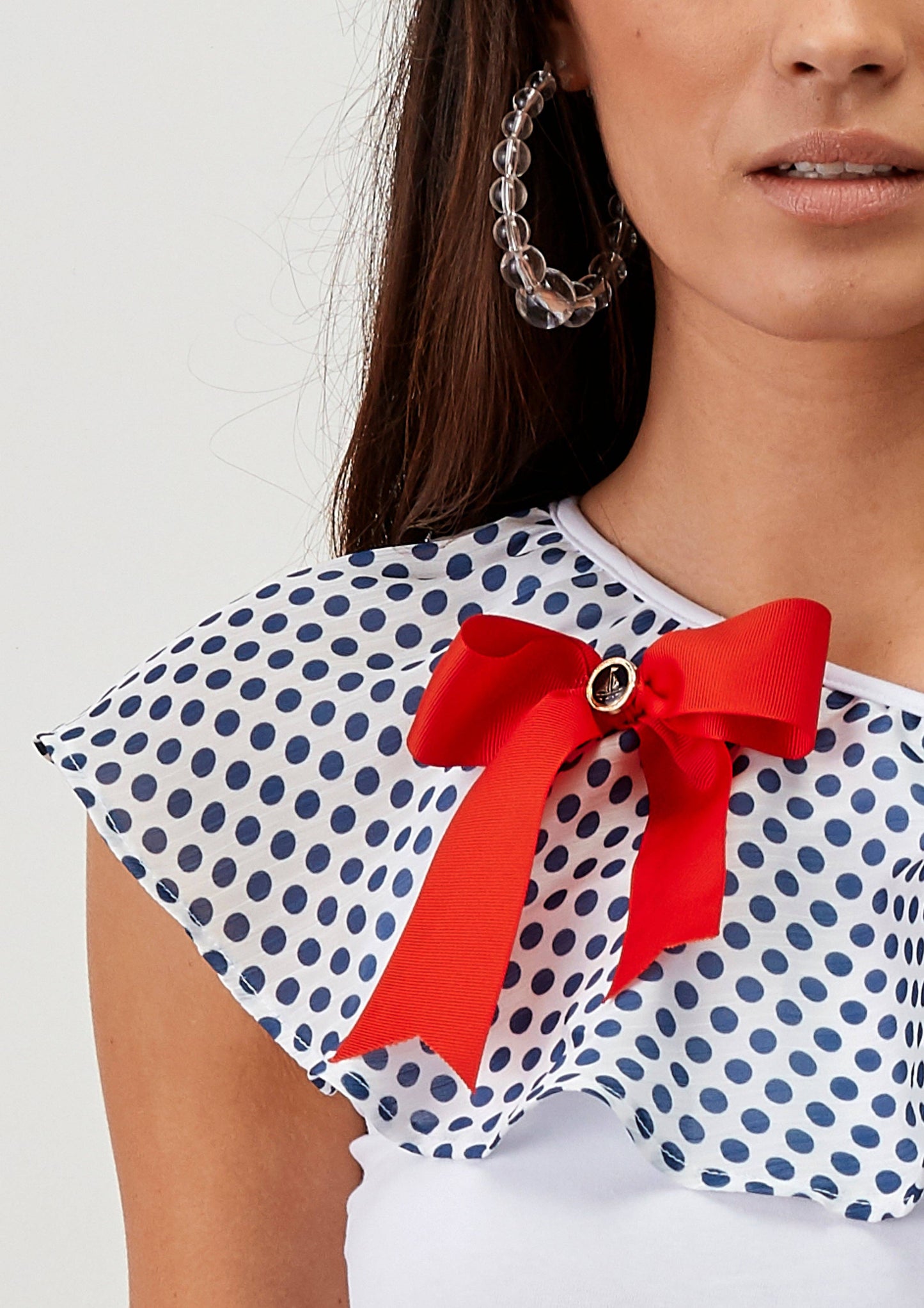 Body in maglia monospalla con volant a pois
