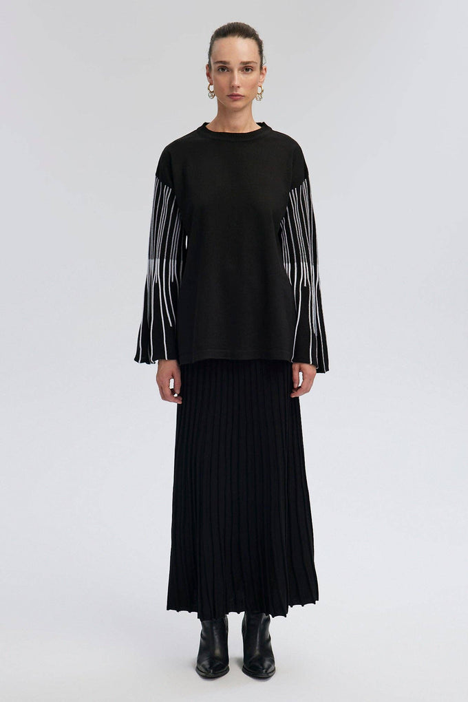 Completo in maglia con tunica e gonna plissé a righe