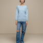 Maglione donna in maglia con tasche applicate
