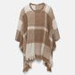 Poncho a quadri con frange
