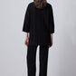 Completo in maglia nero con tunica e pantaloni