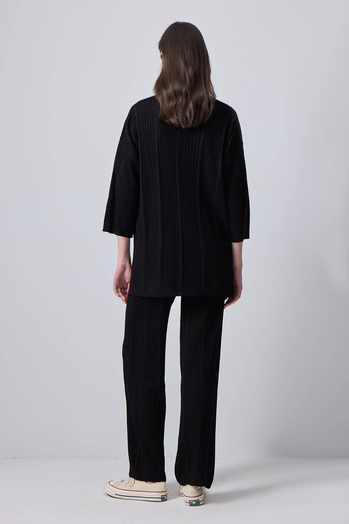 Completo in maglia nero con tunica e pantaloni