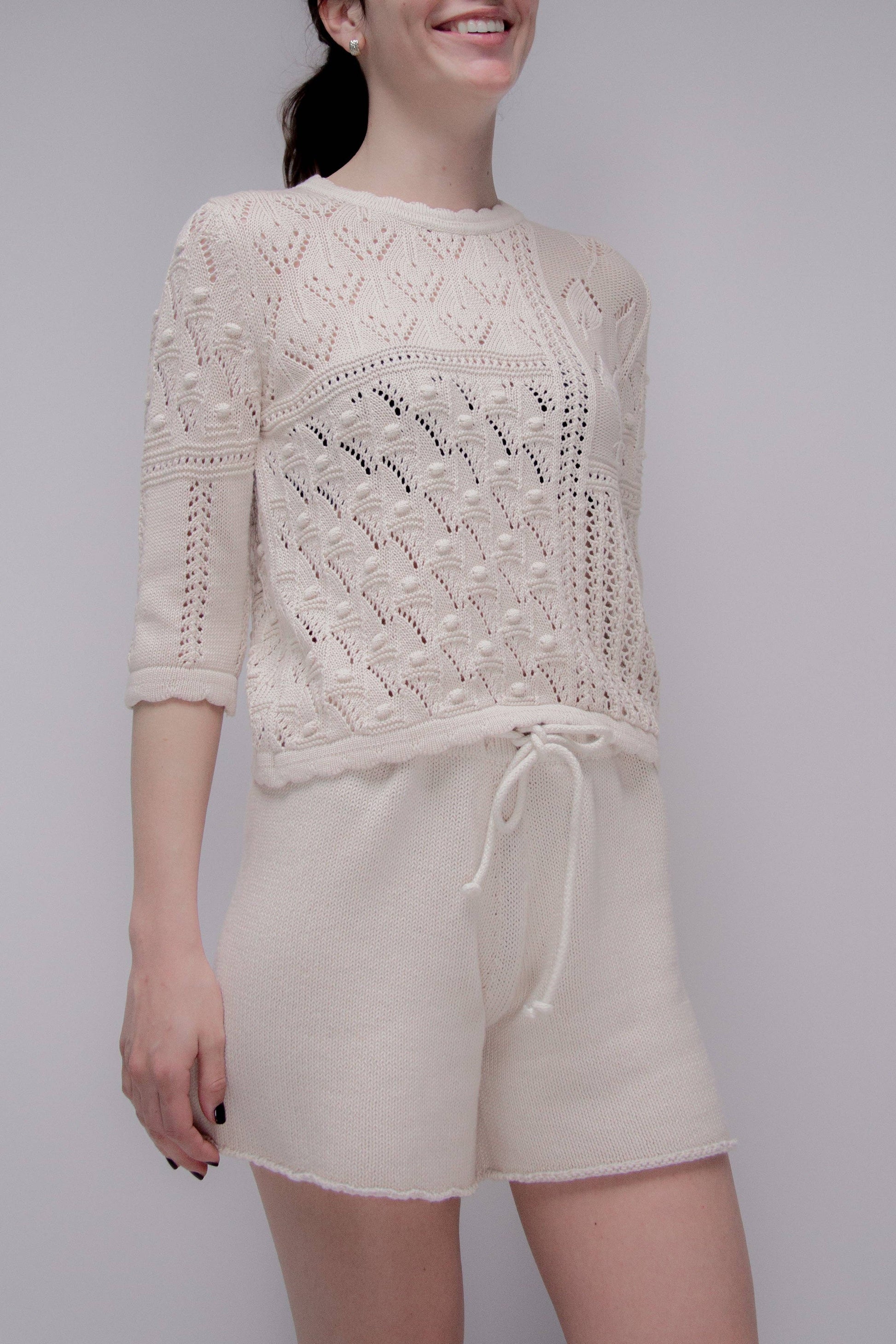 Maglia traforata in cotone con motivo floreale