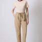 T-shirt in cotone beige con collo a costine a contrasto