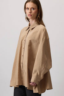 Camicia oversize abbottonata in effetto cupro