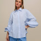 Blusa a righe con volant rinforzati