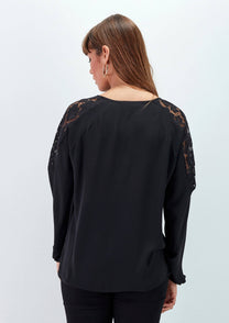Blusa nera con inserti in pizzo e laccio al collo