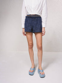 Shorts effetto tweed con catena