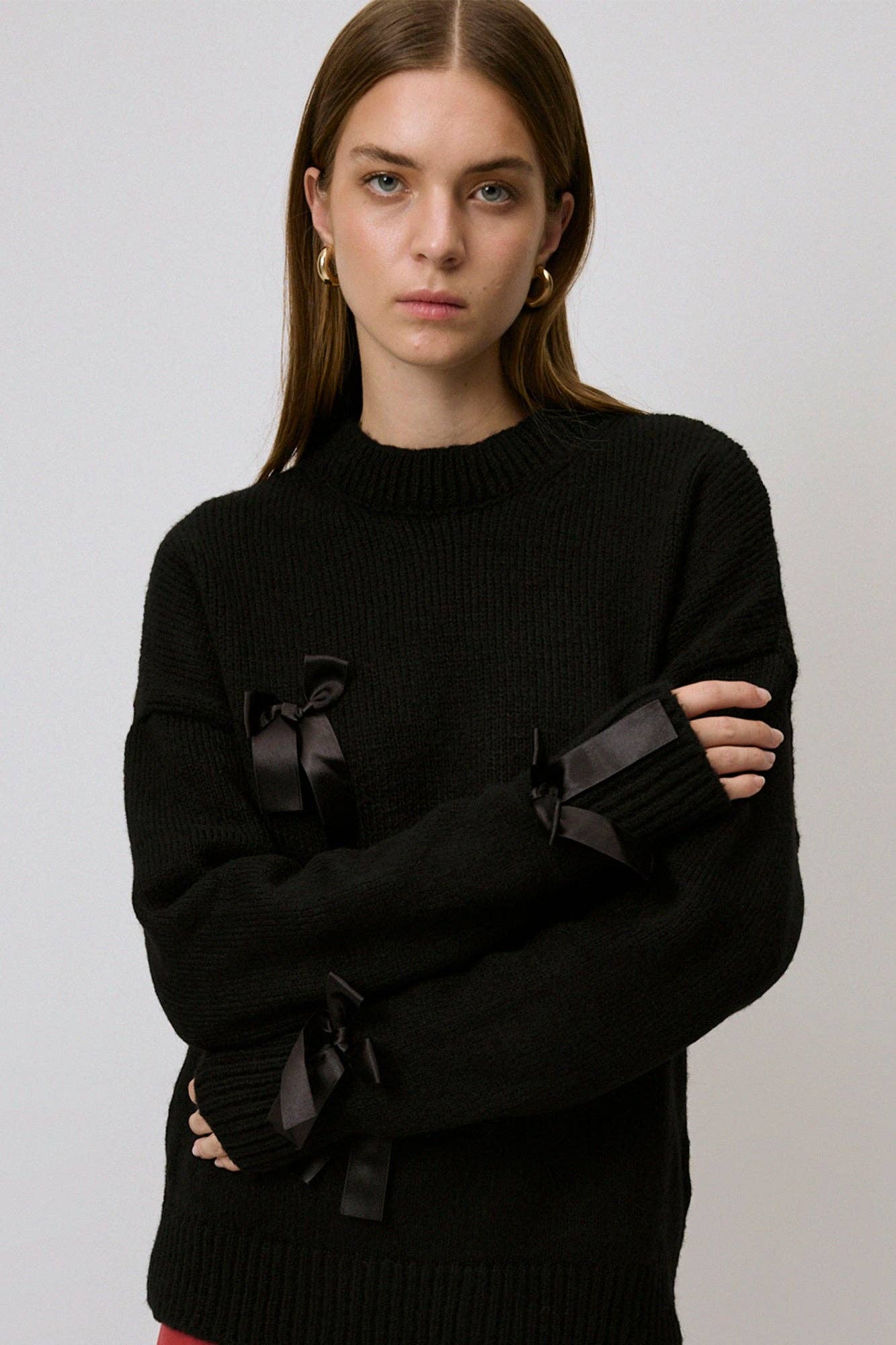 Maglione in maglia con fiocchi