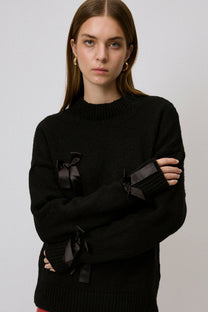 Maglione in maglia con fiocchi
