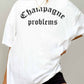 T-shirt oversize grafica “Champagne Problems”