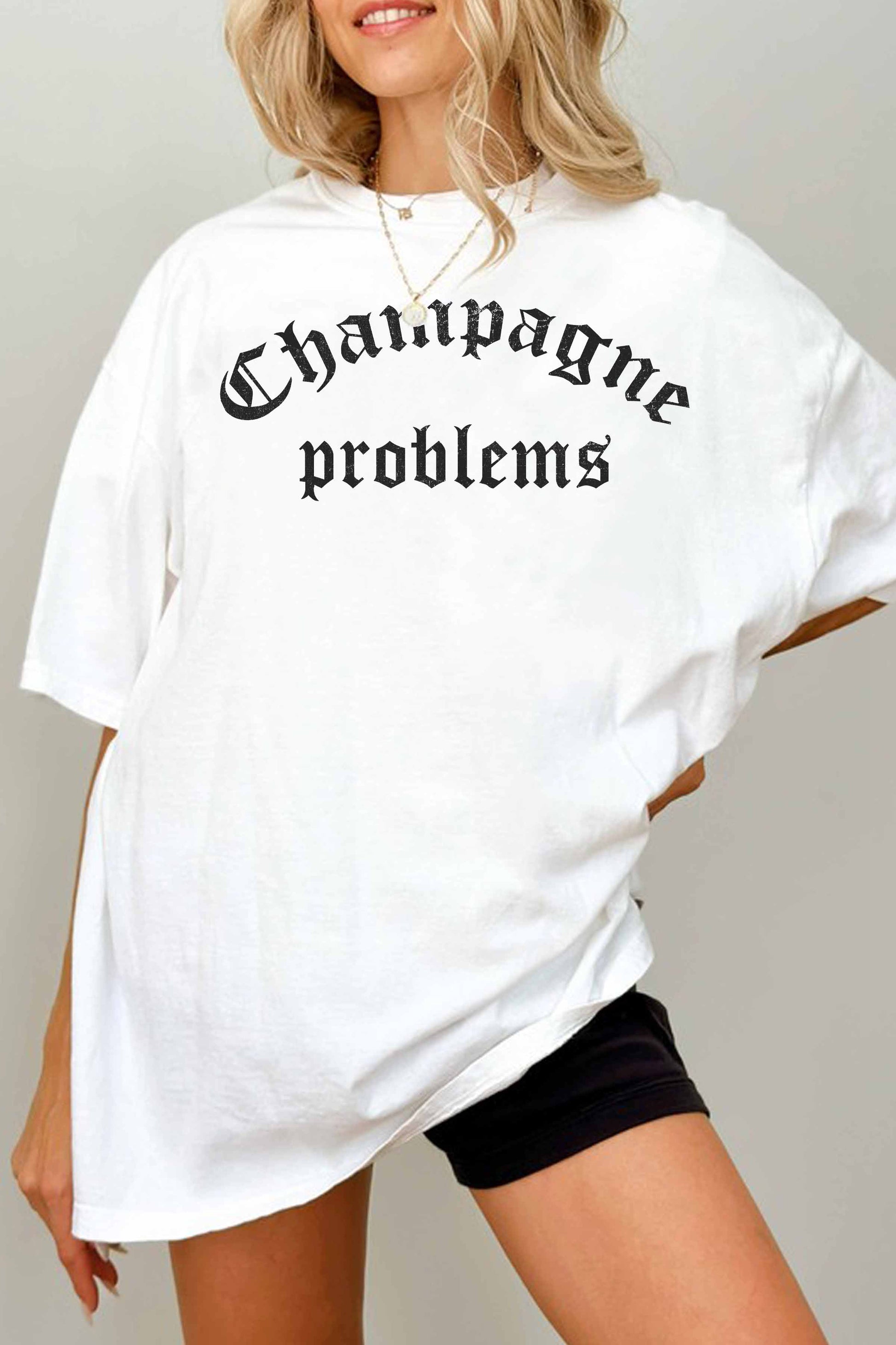 T-shirt oversize grafica “Champagne Problems”