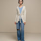 Cardigan in maglia con cintura e micro paillettes
