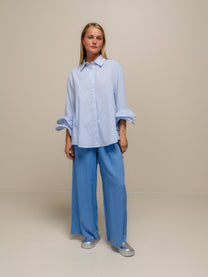 Blusa a righe con volant rinforzati