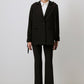 Blazer nero con dettagli metallici