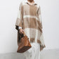 Poncho a quadri con frange