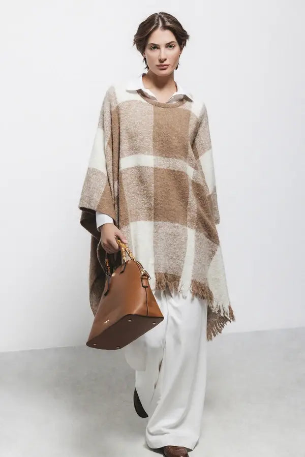 Poncho a quadri con frange