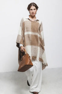 Poncho a quadri con frange