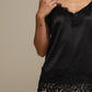 Top in raso con pizzo e spalline sottili