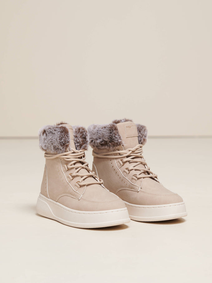 Stivali in eco-pelle con bordo in pelliccia