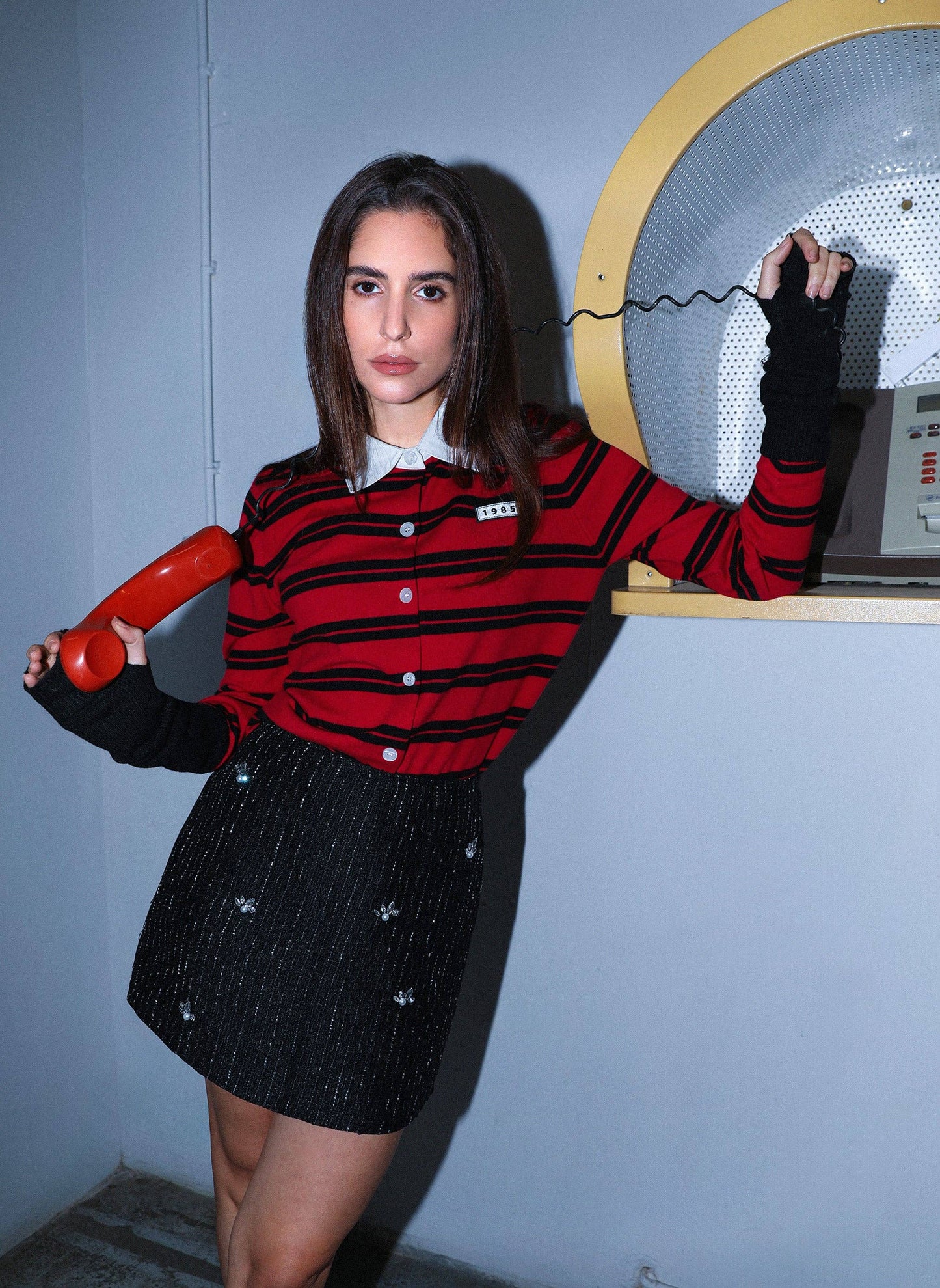 Gonna mini in tweed con strass e perle