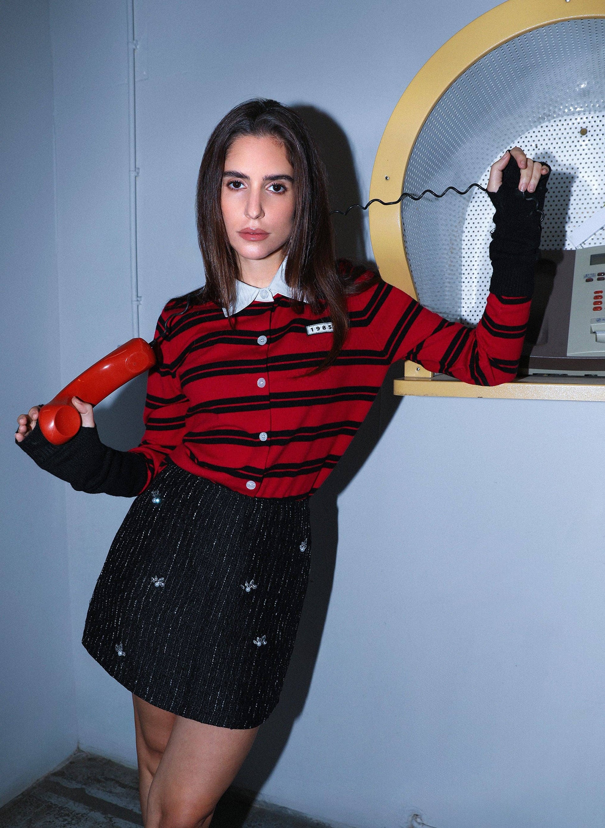 Gonna mini in tweed con strass e perle