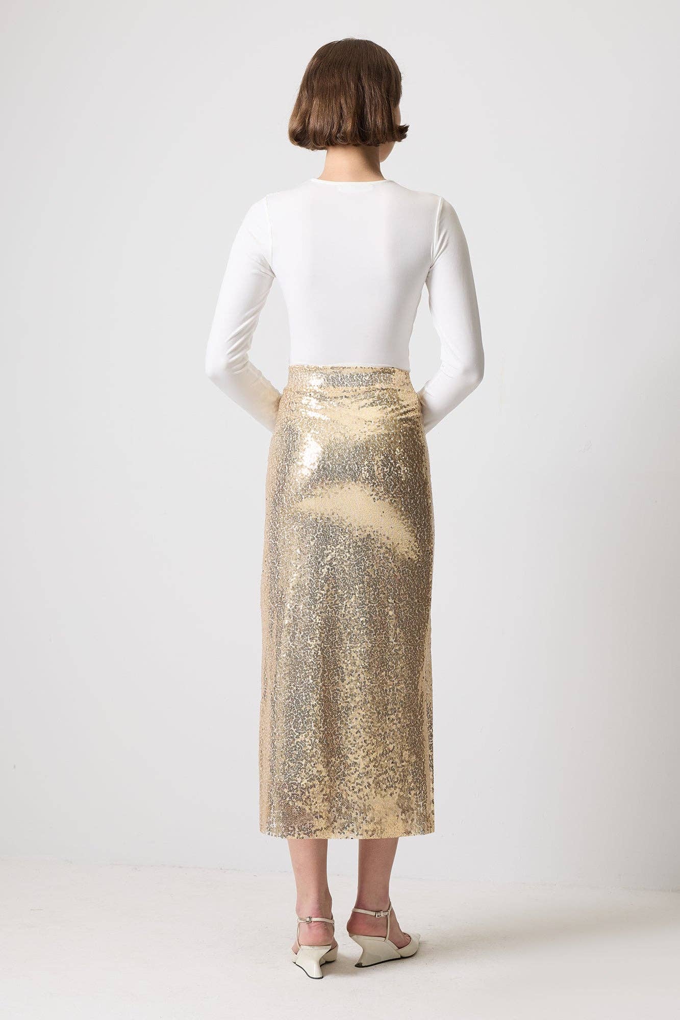 Gonna midi a vita alta in paillettes oro