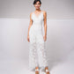 Tuta intera in pizzo con scollo a V e spalline incrociate