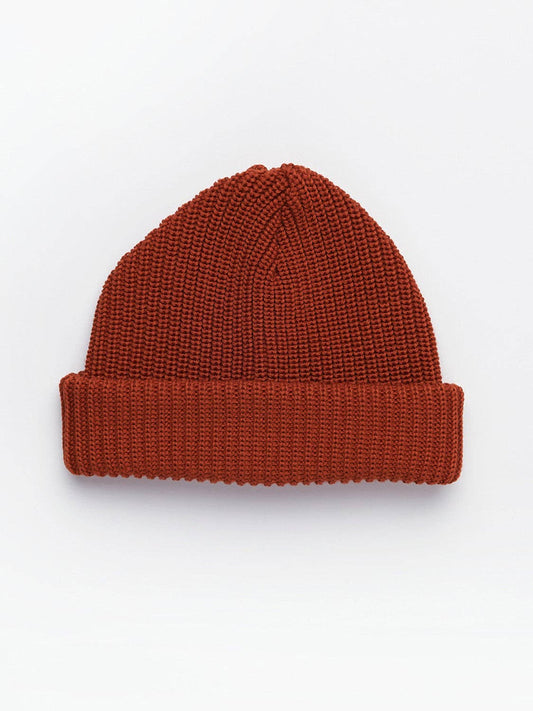 Berretto in lana merino a coste color ruggine